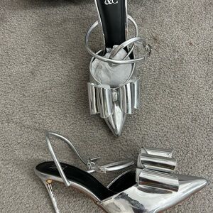 New York & Company brand new Silver Bow Heels! Sexy, classy and a eye stopper!